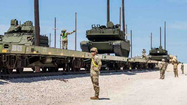 U.S. Army soldiers in Killeen, Texas, load tanks onto trains en route to Washington, D.C., on May 21, 2025, in preparation for the military parade marking the Army's 250th anniversary. (Brandon Bell/Getty Images)